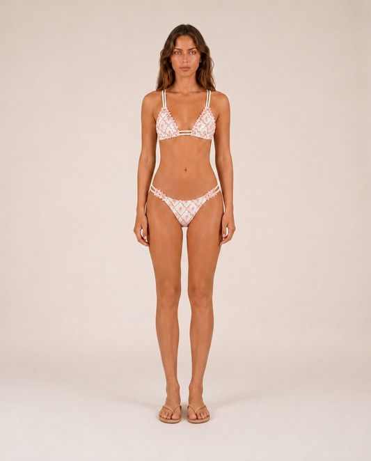 Elodie embroidered bikini front view with ruffle mini skirt luxury mediterranean resortwear