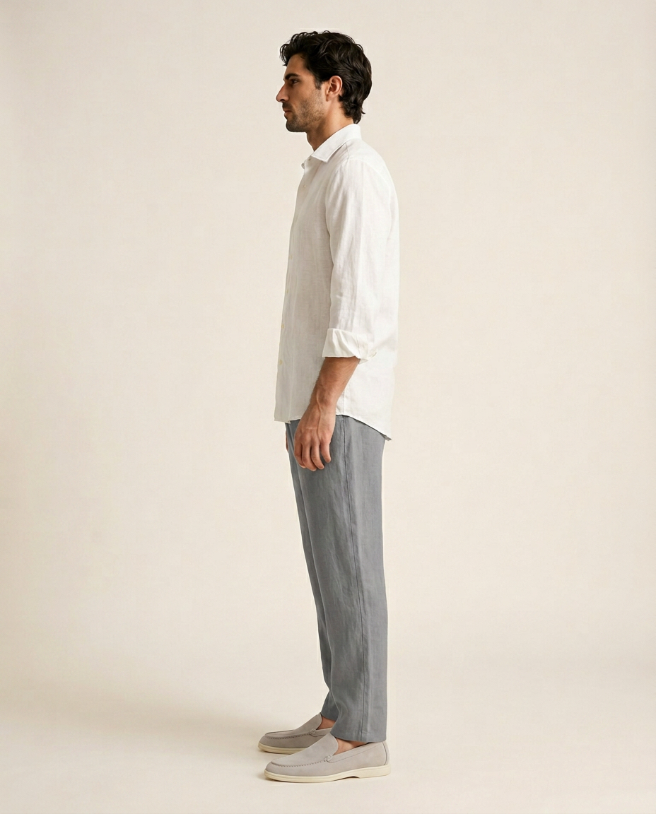 Belluno white linen shirt side view styled with grey linen trousers and white loafers