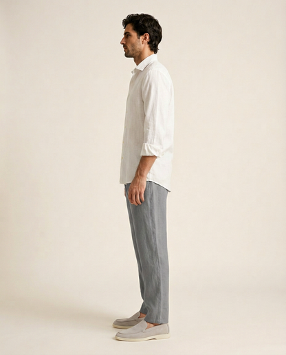 Belluno white linen shirt side view styled with grey linen trousers and white loafers