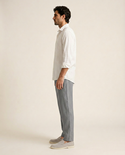 Belluno white linen shirt side view styled with grey linen trousers and white loafers