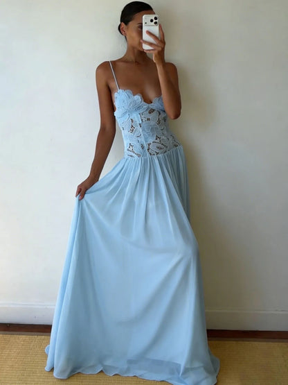 Customer wearing Roséa Maxi Dress indoors with flowing blue skirt
