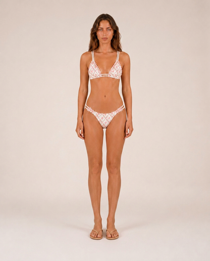 Elodie embroidered bikini front view with ruffle mini skirt luxury mediterranean resortwear