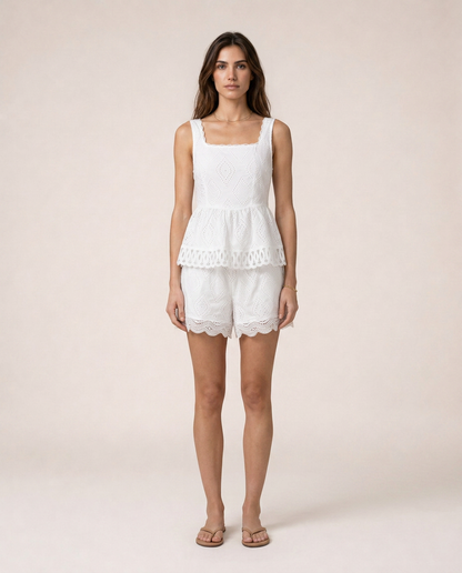 Isola white broderie set front view peplum top and embroidered shorts luxury mediterranean resortwear