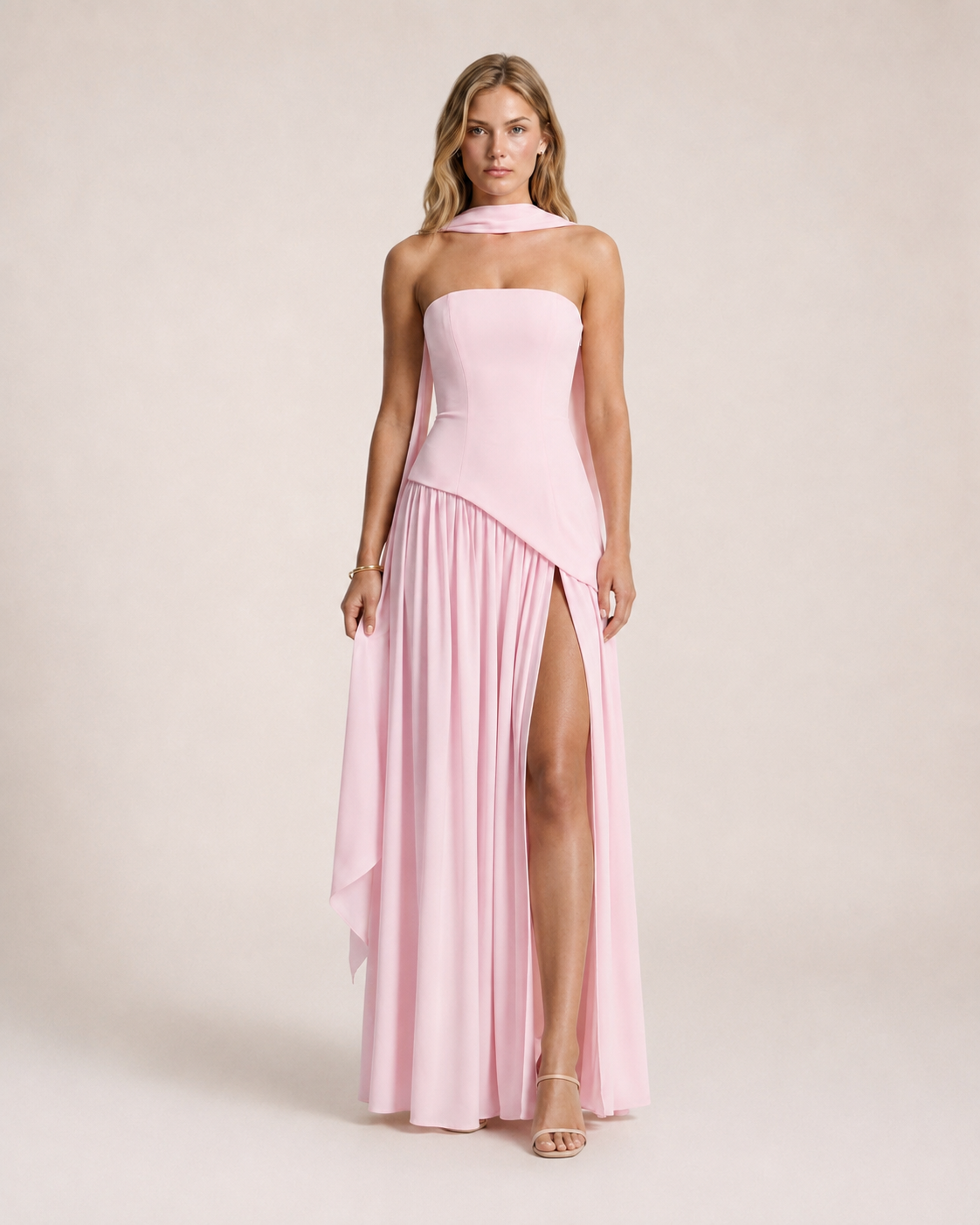 Luna Rosa Maxi Dress featuring a structured strapless bodice, flowing full-length skirt, elegant side slit and matching scarf detail in soft blush pink