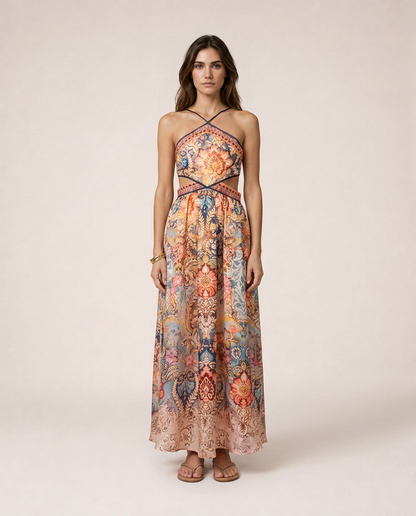 Sofia Dress featuring a Mediterranean-inspired ornamental print, halter neckline, fitted silhouette and asymmetrical handkerchief hem