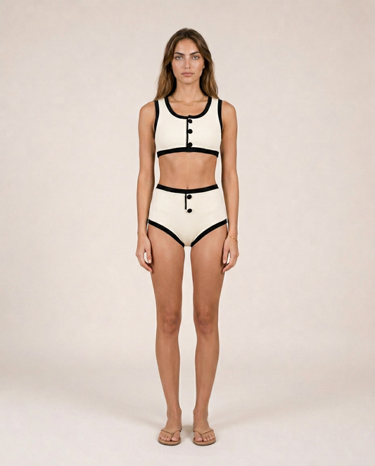 Thalassa ivory and black contrast bikini vintage-inspired luxury swimwear elegant mediterranean resort style front view