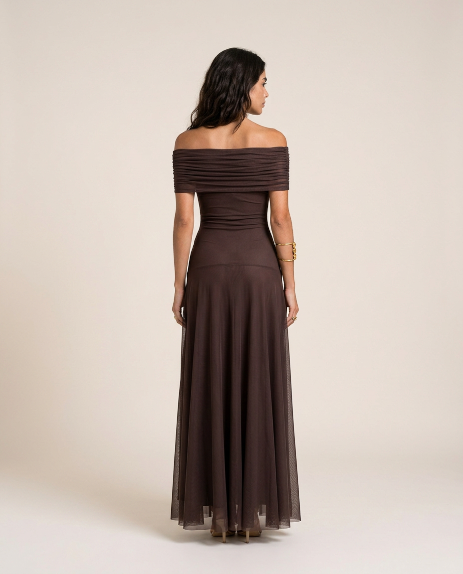Back view of the Alessia Maxi Dress in chocolate brown with an off-shoulder neckline and flowing maxi skirt