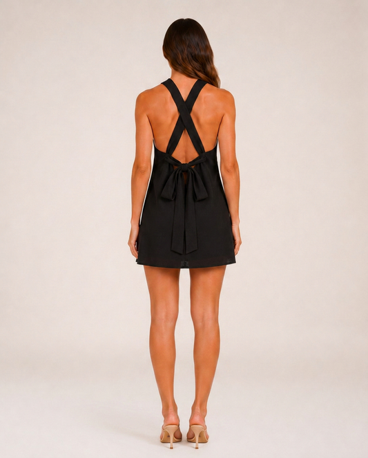 Marbella Noir & Blanc Mini Dress rear view showing crossed straps and open back
