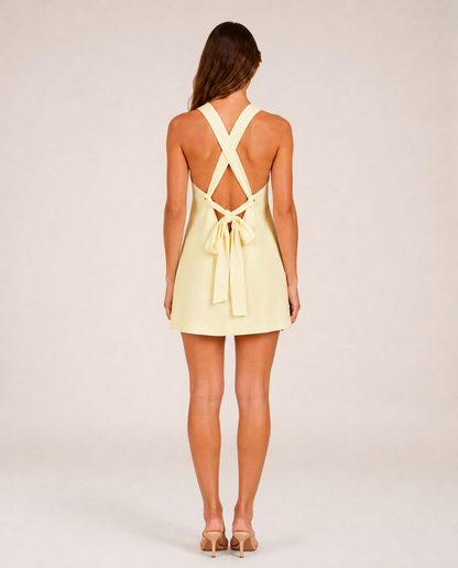 Marbella Mini Dress rear view showing crossed straps and tie-back detail