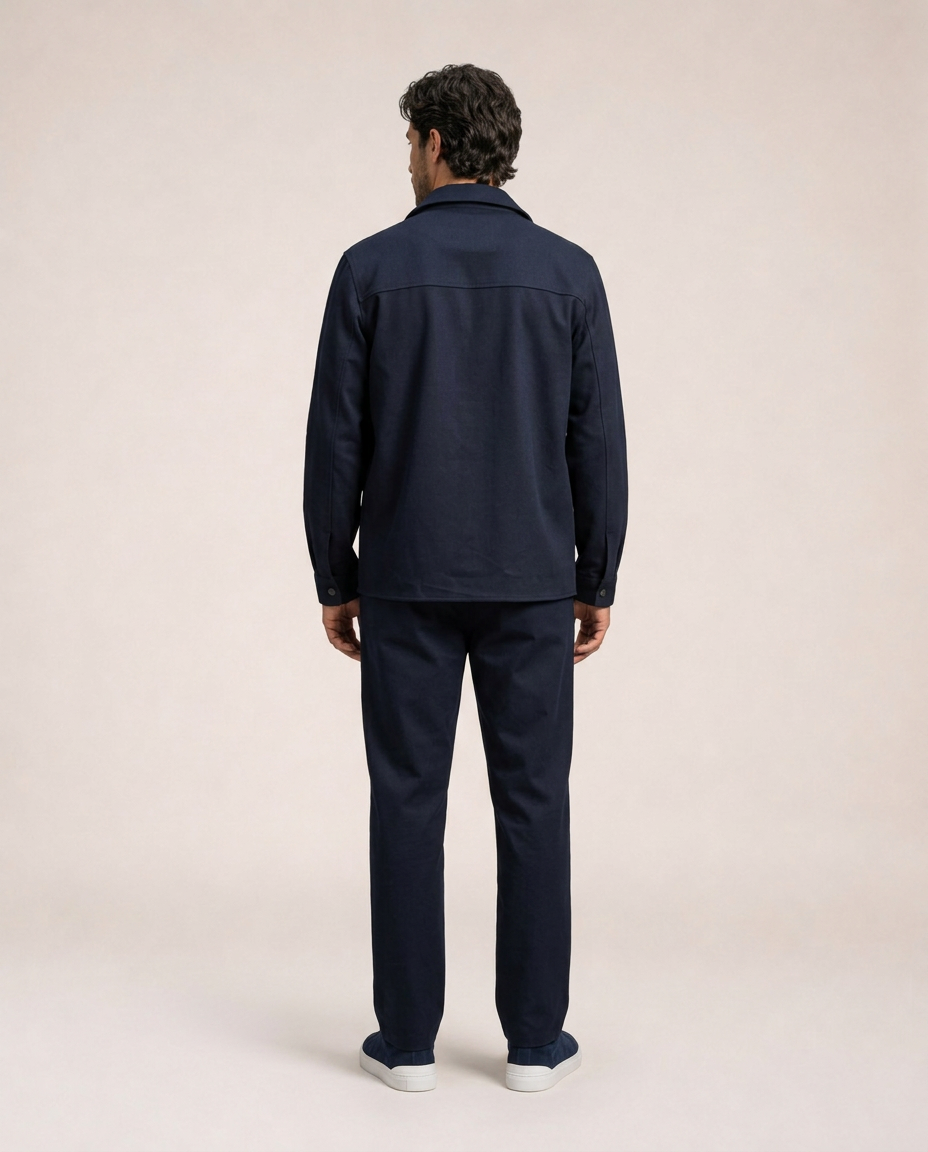 Nilo navy jacket back view with long sleeves and relaxed fit