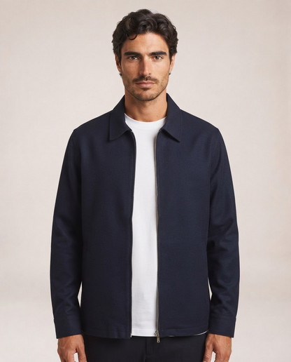 Nilo navy jacket close-up showing collar, zip closure and clean finish