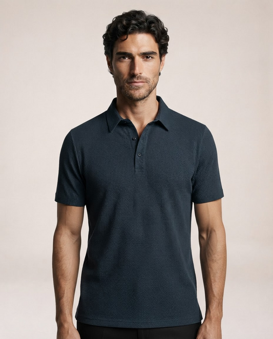 Vinicius navy blue polo shirt front view with textured fabric and short sleeves
