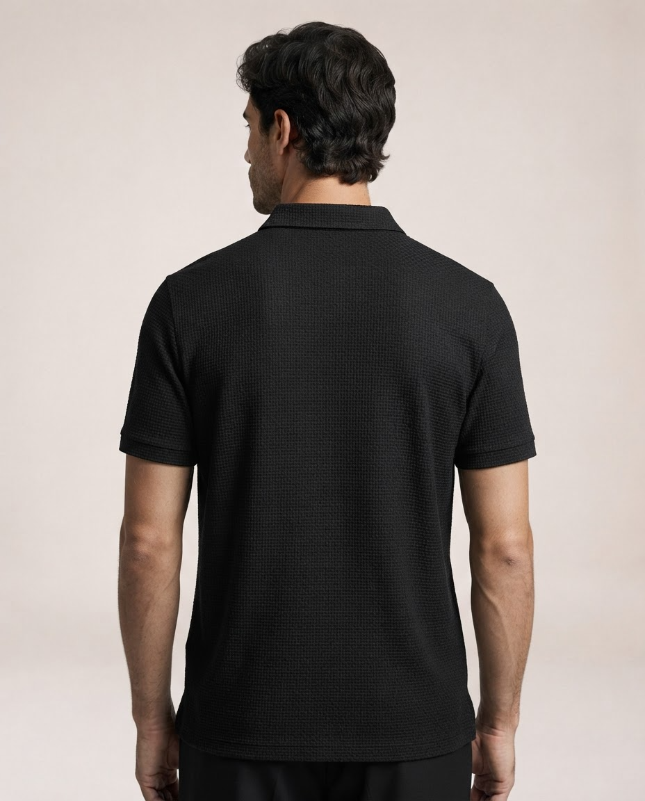 Vinicius black polo shirt back view with textured fabric and short sleeves