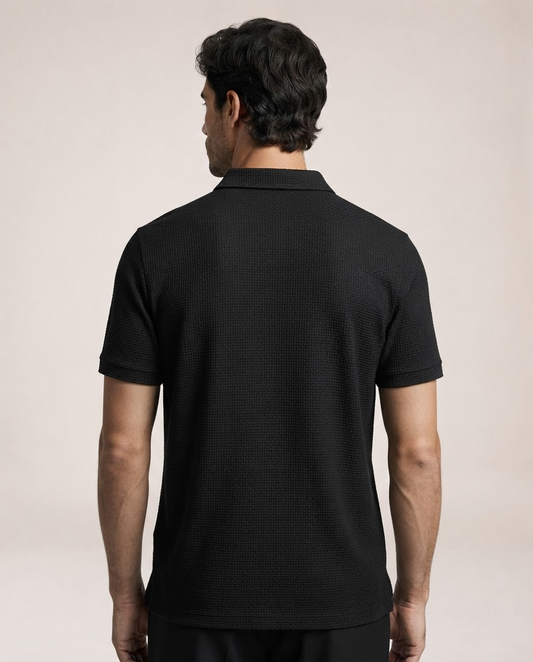 Vinicius black polo shirt back view with textured fabric and short sleeves