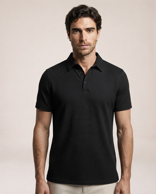 Vinicius black polo shirt close-up showing textured fabric and button collar